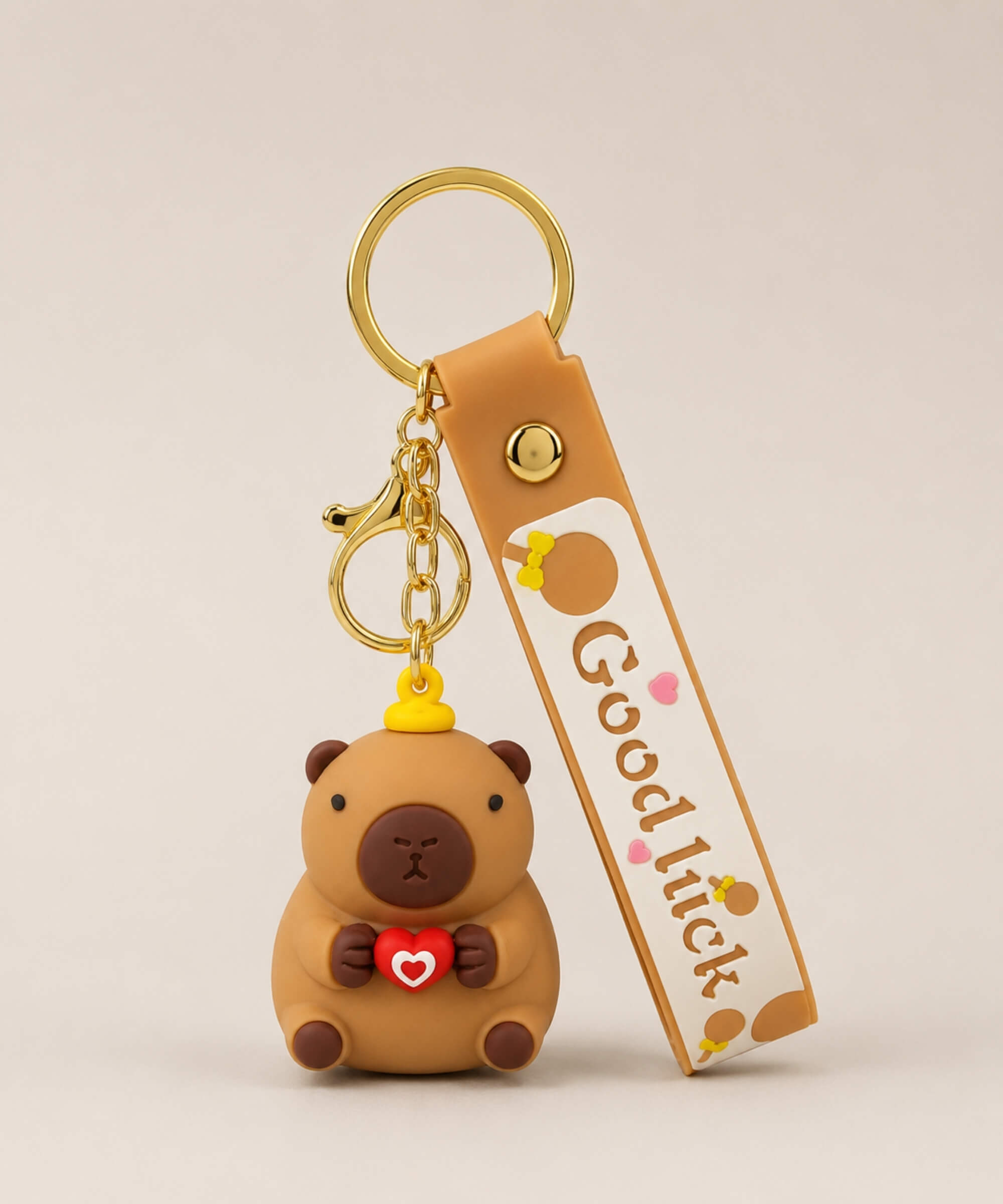Capybara heart classic keychain with brown strap, gold hardware and cute character bag charm